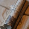 Semainier en argent 925 recyclé Éclats Nomades disposé sur un fond beige minimaliste