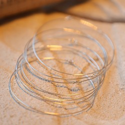 Set de bracelets semainier argent 925 indéformable création française sur fond neutre